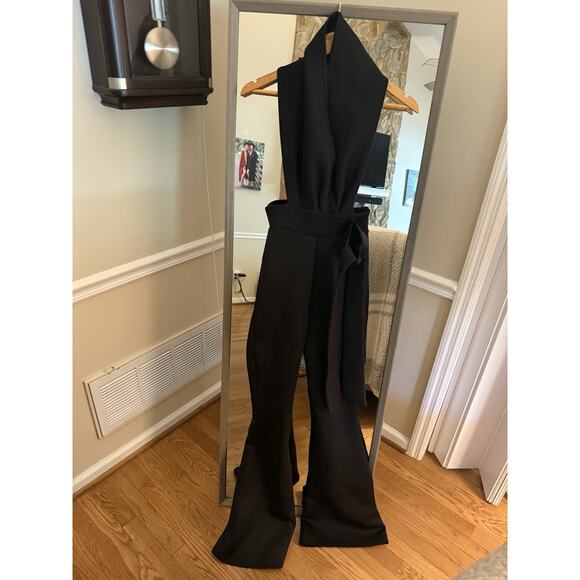 PrettyLittleThing black BLACK TEXTURED CROSS HALTER TIE WIDE LEG JUMPSUIT Size 0 - Picture 3 of 7